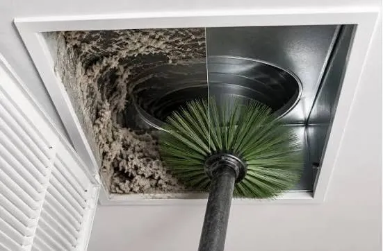 Duct sanitizing treatment being applied to ductwork